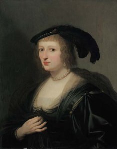 Portrait of Ursula van Solms, half-length, in a black dress and feathered hat, her crucifix in her right hand